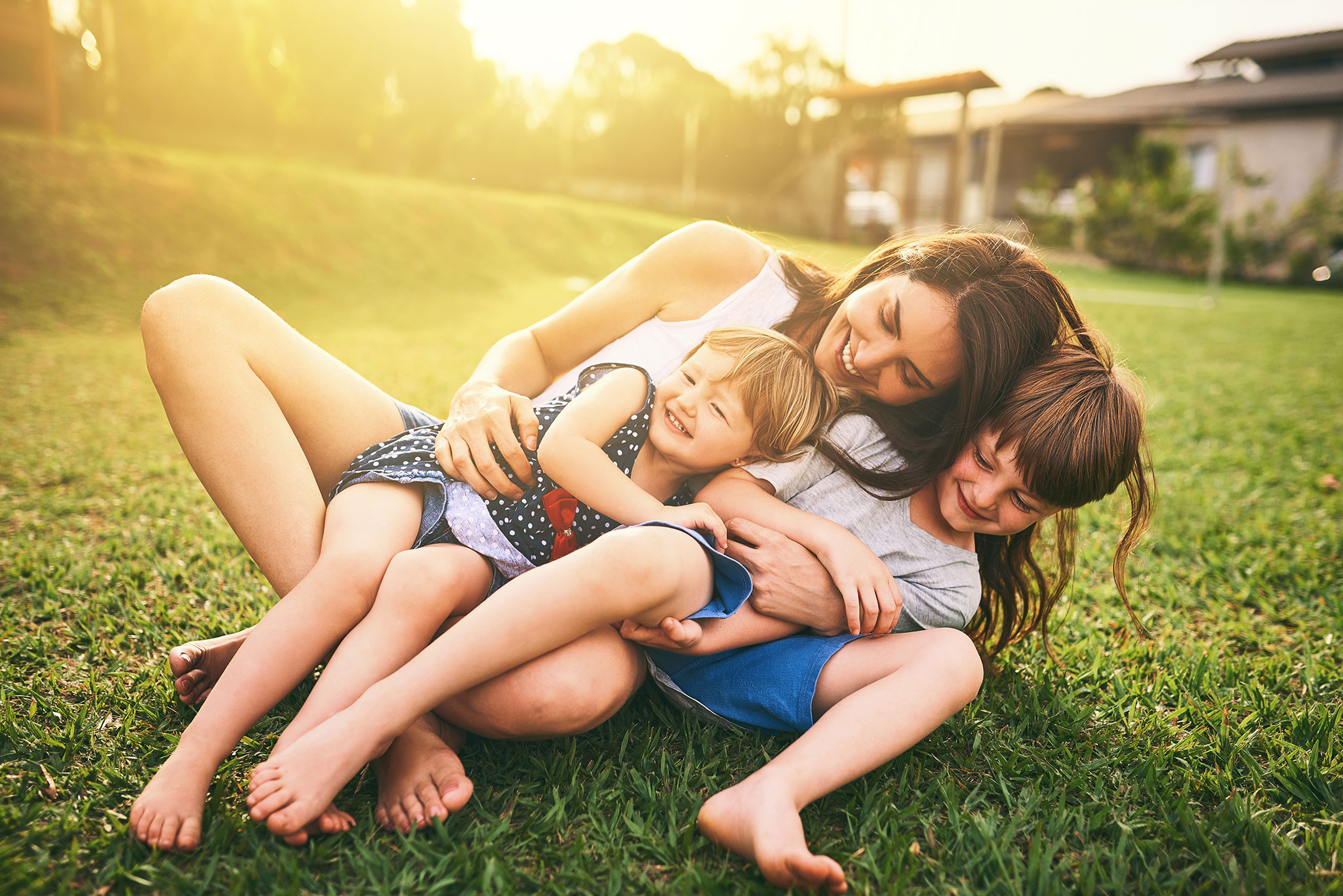 family enjoying pest-free yard that is protected by mosquito control from american pest